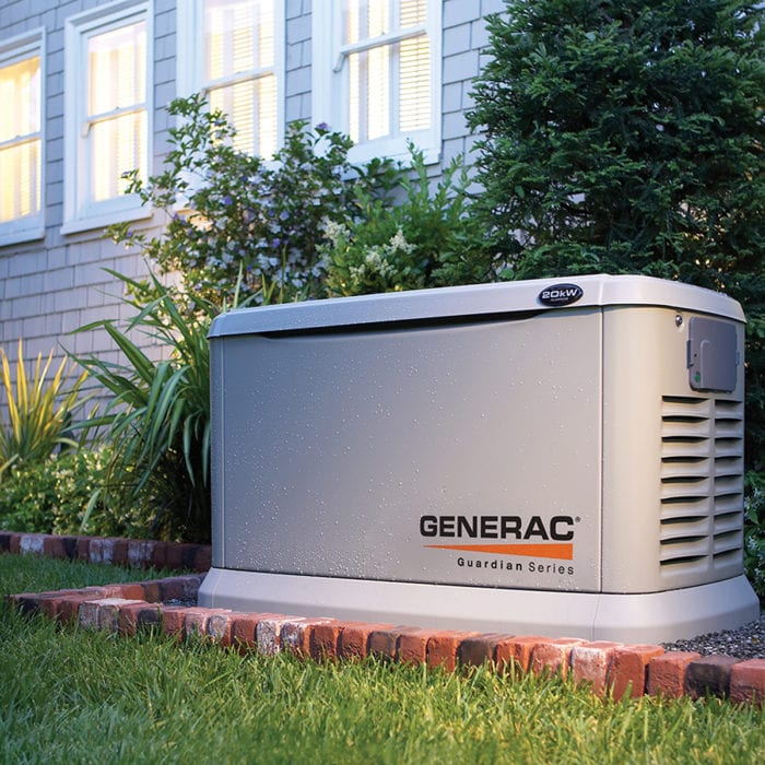 A grey generator in a garden