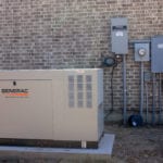 A large generac brand generator outside