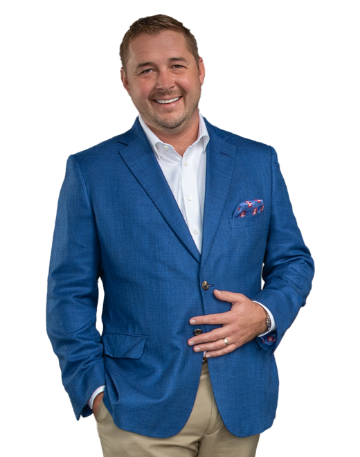 A man wearing a blue suit smiling